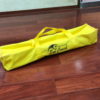Billie Jean King's Eye Coach yellow carry bag