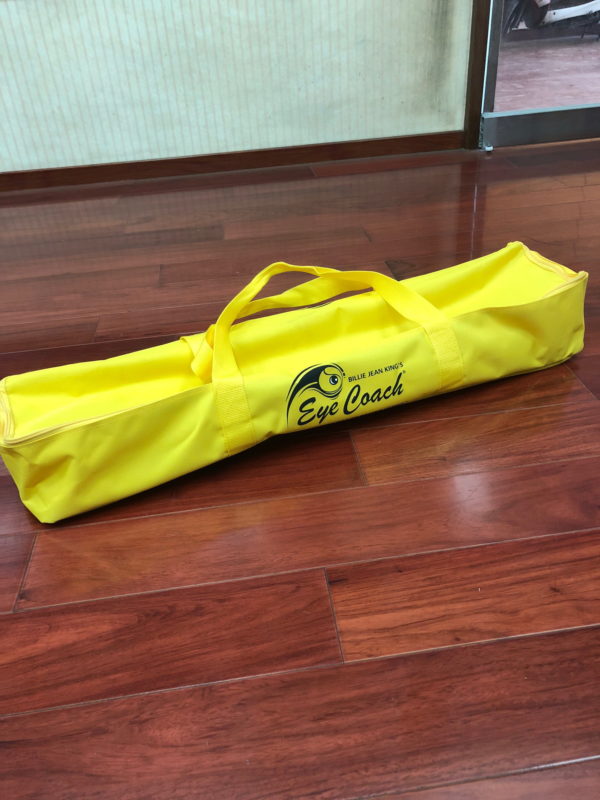 Billie Jean King's Eye Coach yellow carry bag