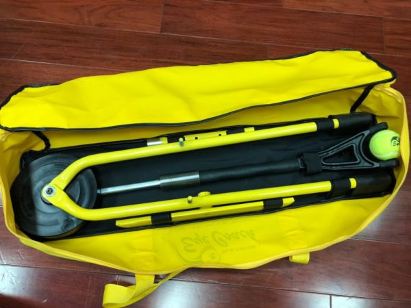 Billie Jean King's Eye Coach yellow carry bag with Eye Coach Junior